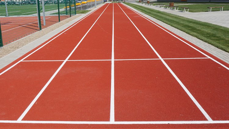 PISTA DE ATLETISMO - CAUCHO ENCAPSULADO EN COLOR